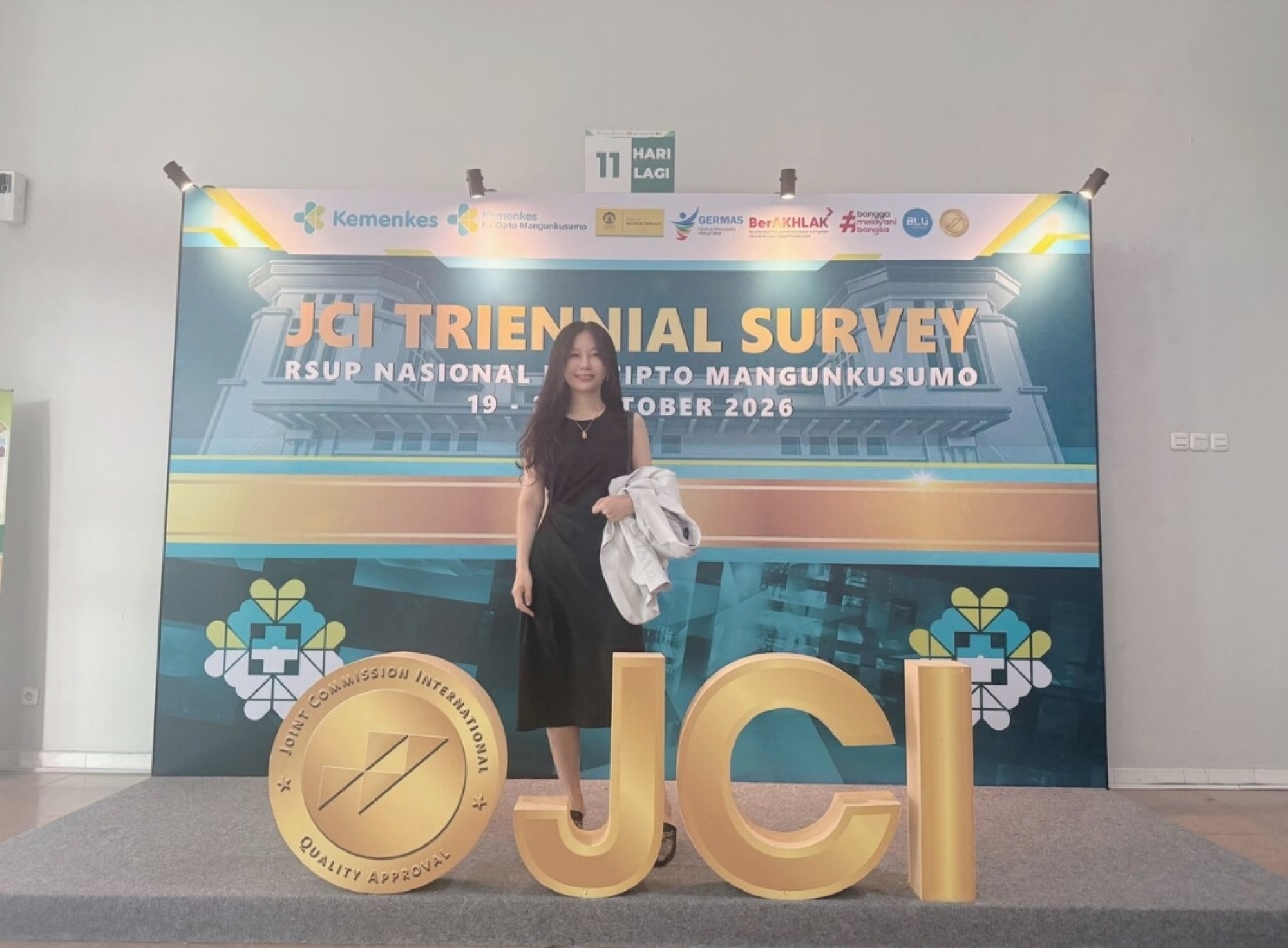 Lexaid Founder Suky Ji at the JCI Triennial Survey backdrop for RSUP Nasional Dr. Cipto Mangunkusumo
